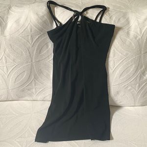 A black dress by Cache .